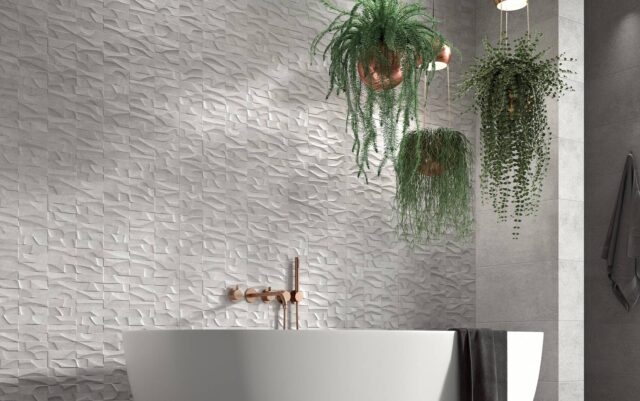 Bathroom-with-bathtub-and-plants-hanging-from-the-ceiling-wall-tiles