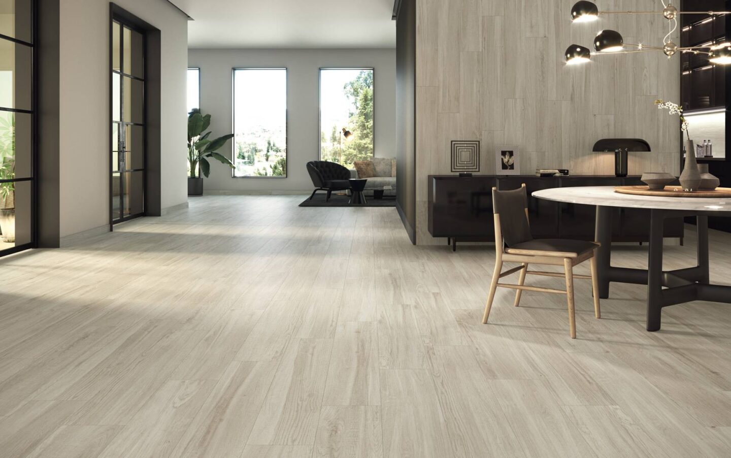 Livingroom-with-woodlike-floor-tiles-sitting-areas-and-sofa-in-the-background