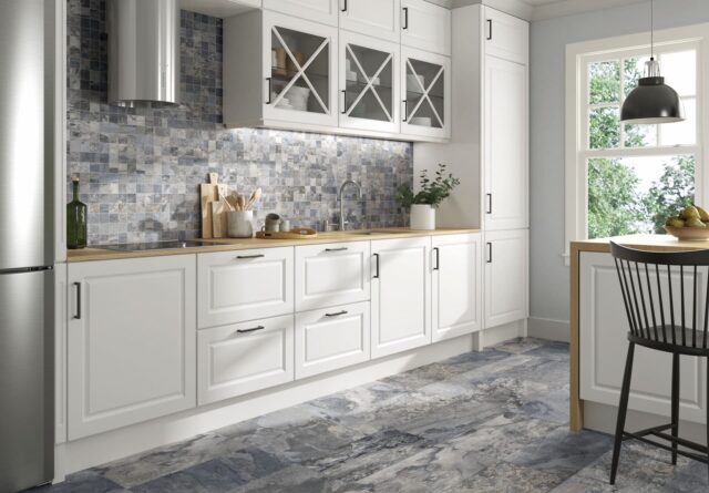 Kitchen with grey colored floor and wall tiles