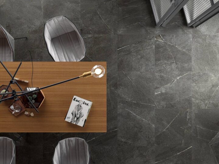 Grafito-table-on-dark-tiles-seen-from-above