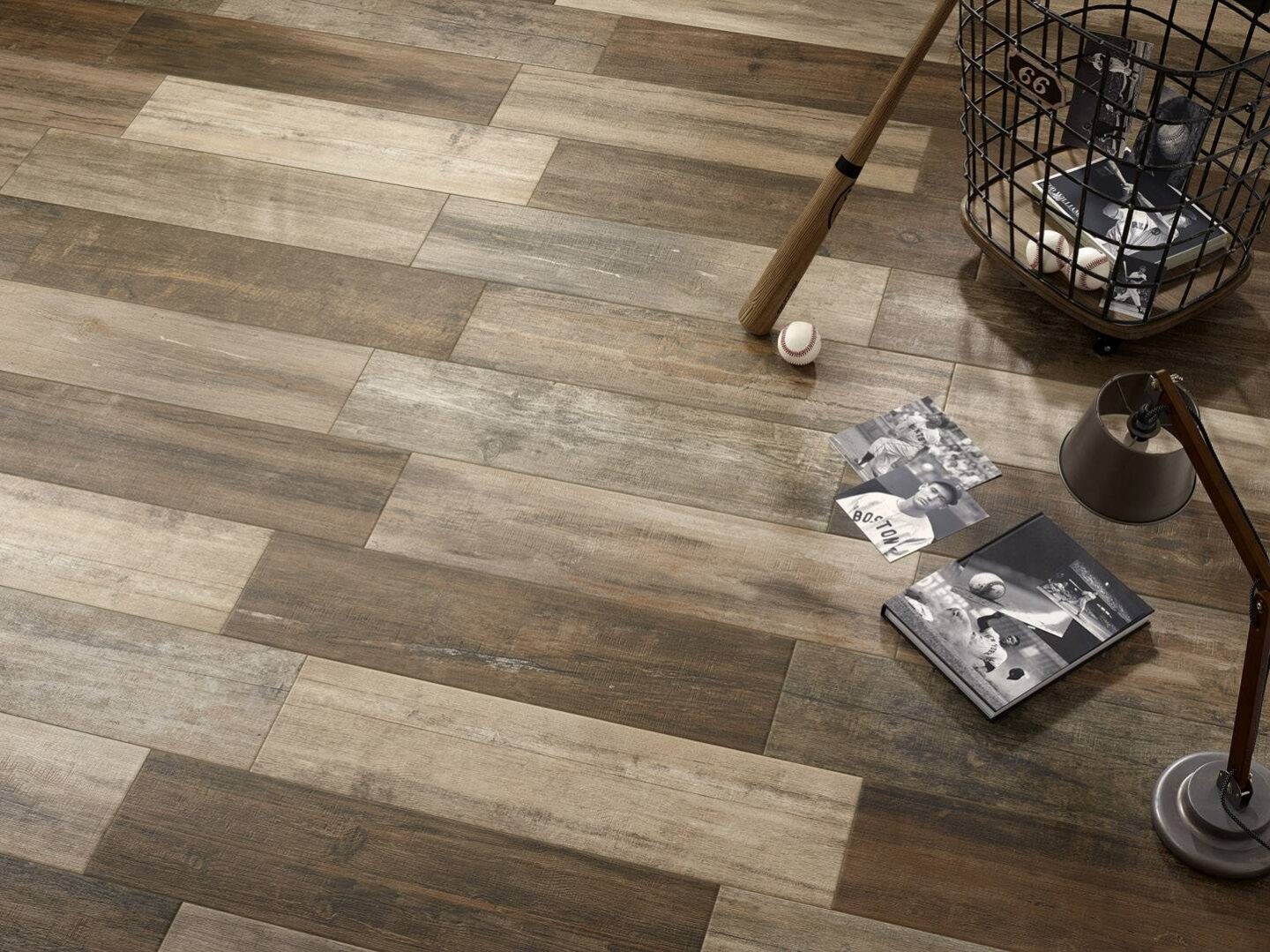 Woodlike-tiles-floor-with-baseball-batt-and-magazines