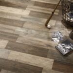 Woodlike-tiles-floor-with-baseball-batt-and-magazines