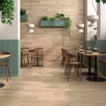 Restaurant-with-woodlike-tiles-plants-on-the-walls