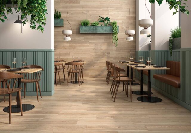 Restaurant-with-woodlike-tiles-plants-on-the-walls