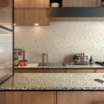 Kitchen with beige wall tiles