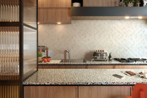 Kitchen with beige wall tiles