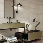 Bathroom with light grey wall tiles and basin