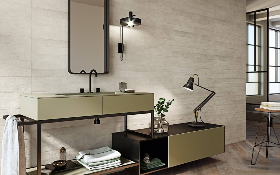 Bathroom with light grey wall tiles and basin