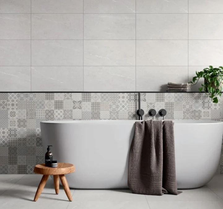 Mate creme colored wall tiles in bathroom with a bathtub