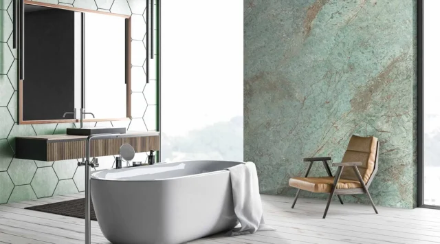 Bathroom with green color chlorophyll wall tiles with a bathtub and sink